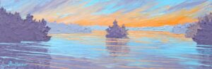 A gorgeous sunset over a peaceful evening scene.